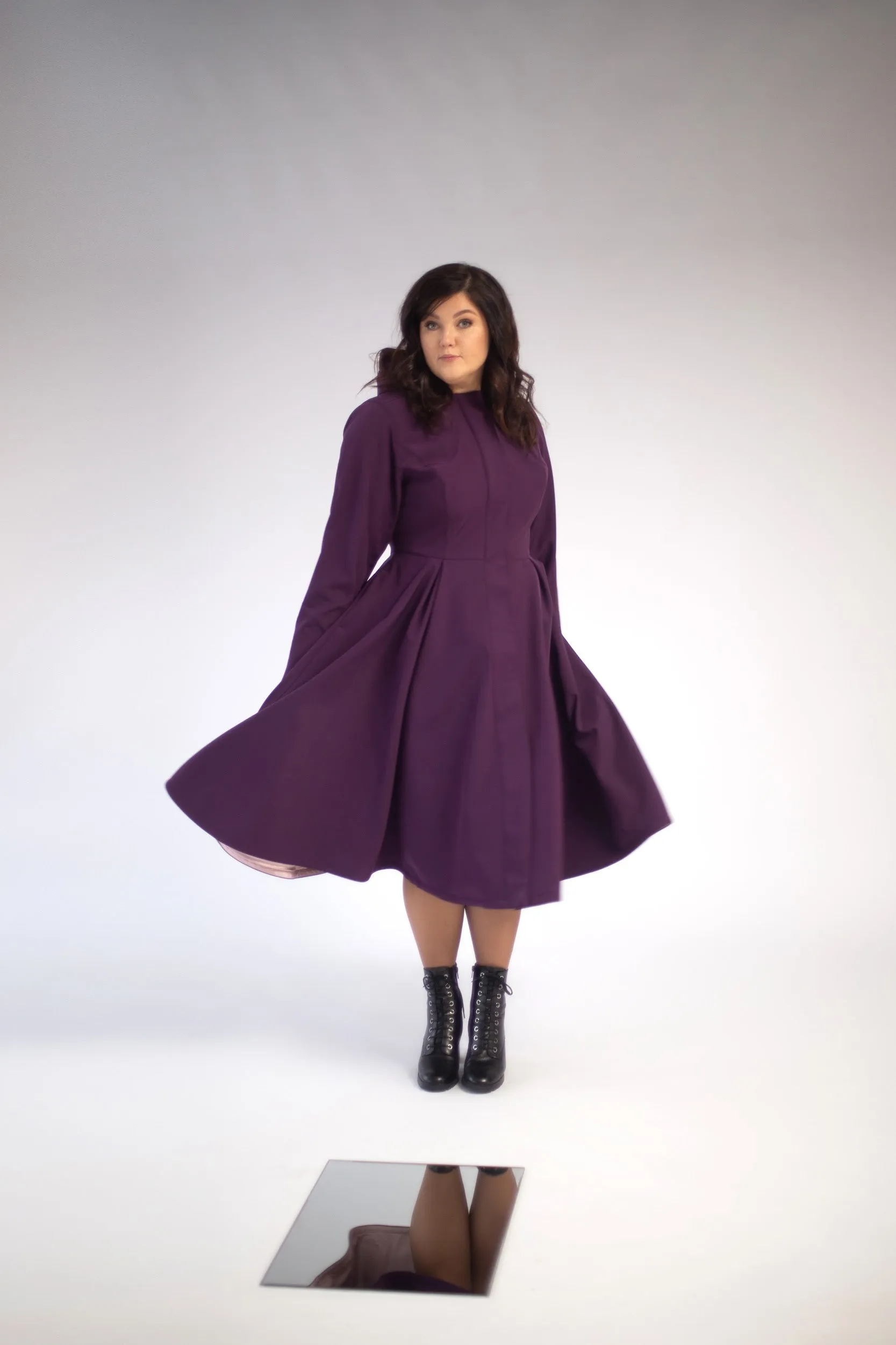 Fitted and Flared Coat with Pleated Skirts in Dark Purple | 'Ruby Purple'