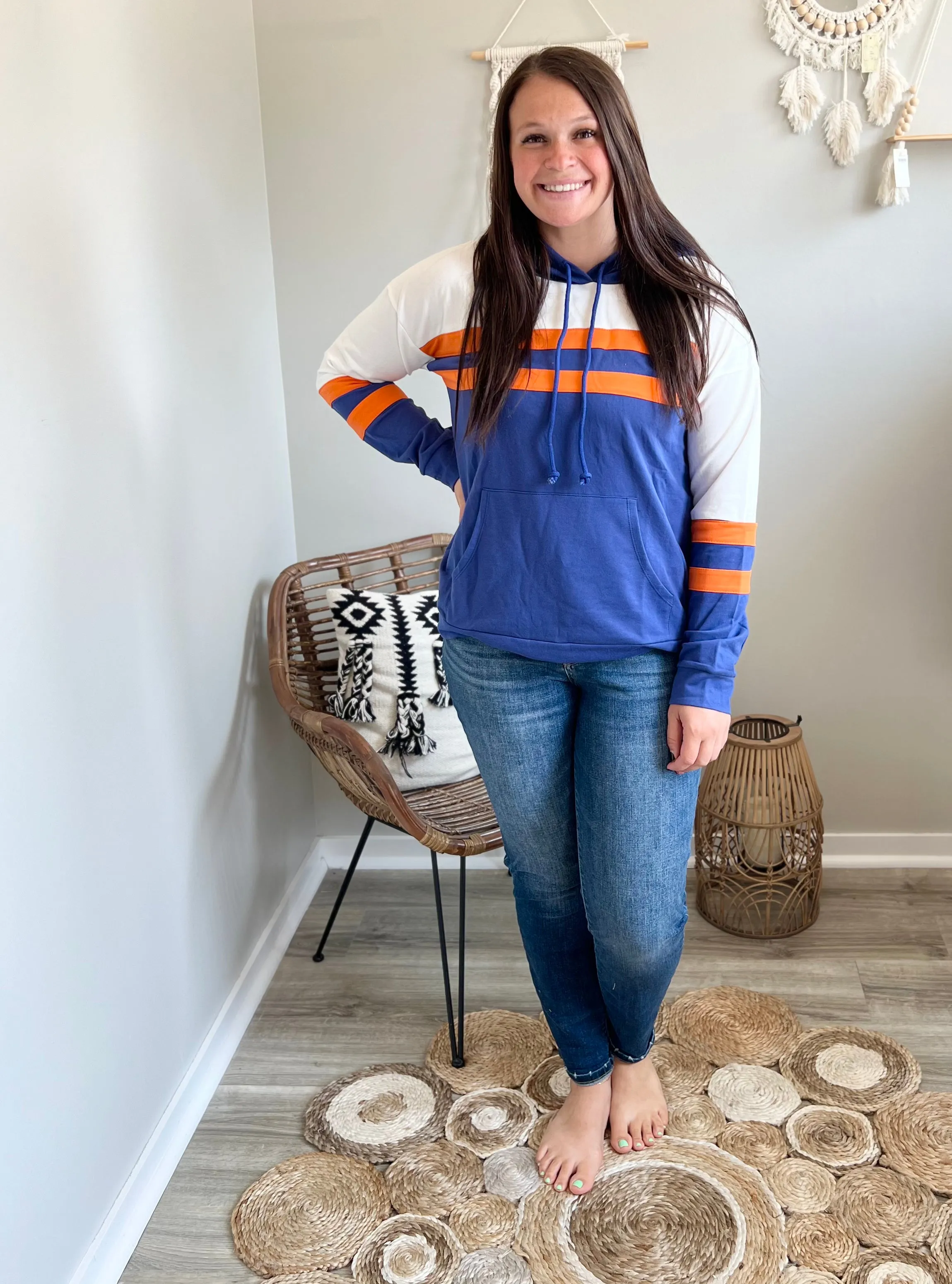 Orange striped sweatshirt